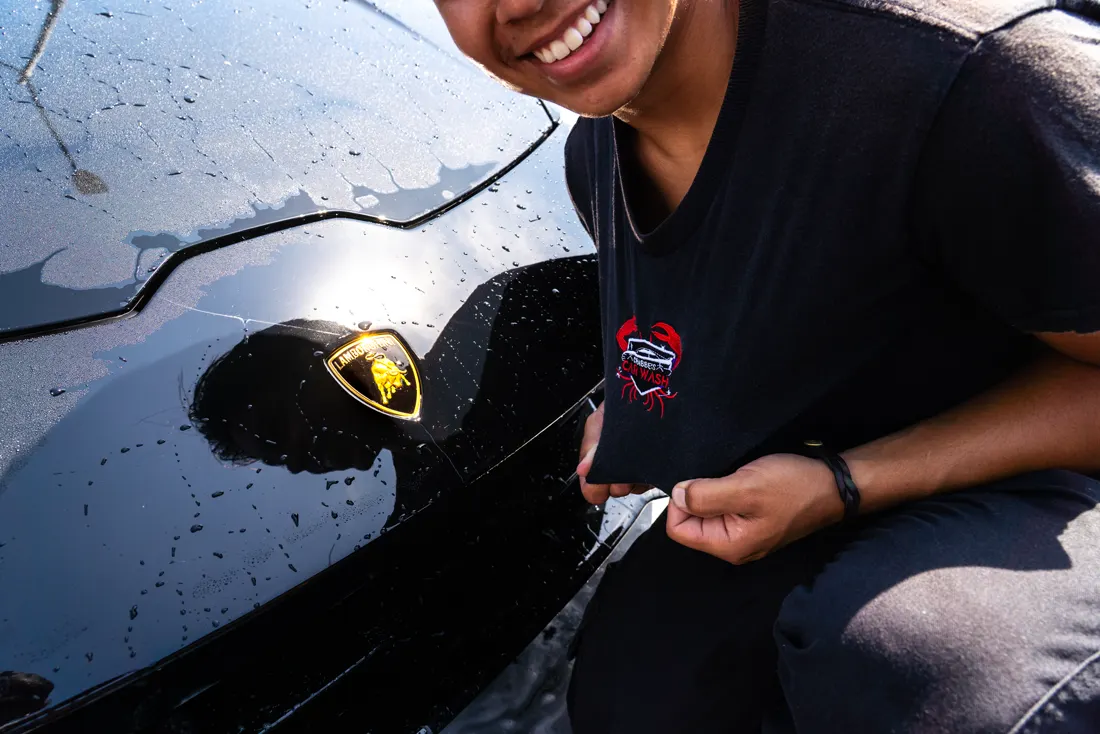 Drying the Lamborghini badge by hand