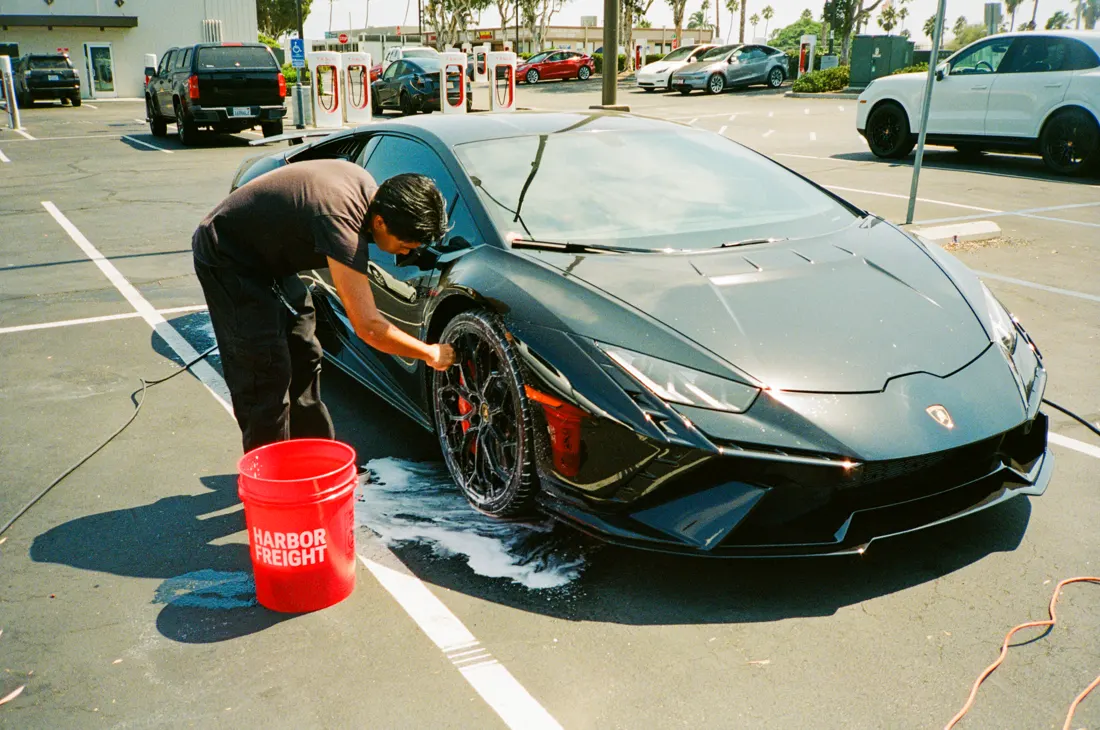 Mobile detailing a black Lamborghini Huracán in Oceanside